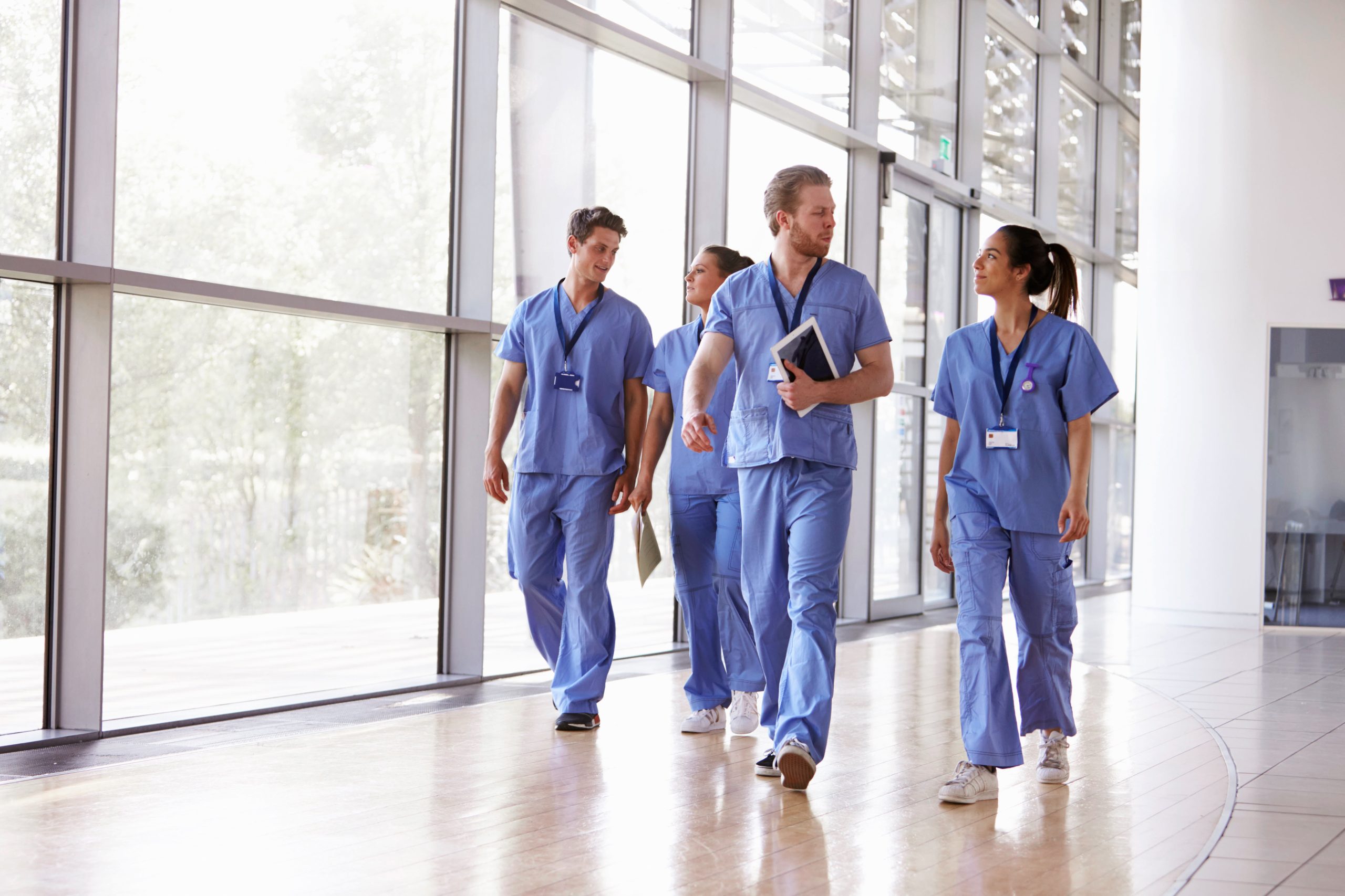 healthcare job outlook. Image of healthcare professionals walking
